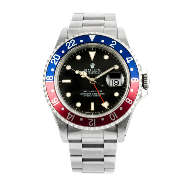 Rolex GMT Master II Pepsi, NOS with light Fucsia bezel complete with Box and Guarantee