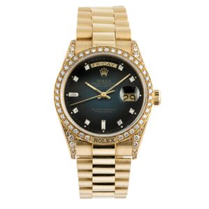 Rolex Daydate President 18138 with "Petrol Blue" vignette dial, factory diamonds on bezel and lugs in 18k yellow gold