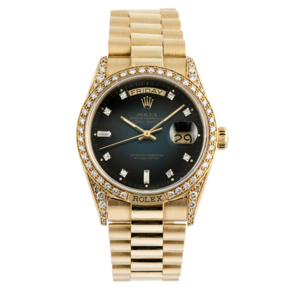 Rolex Daydate President 18138 with "Petrol Blue" vignette dial, factory diamonds on bezel and lugs in 18k yellow gold